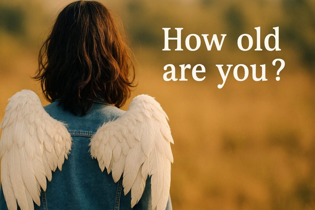 翼の折れたエンジェルの後ろ姿
白で「How old are you」のテキスト