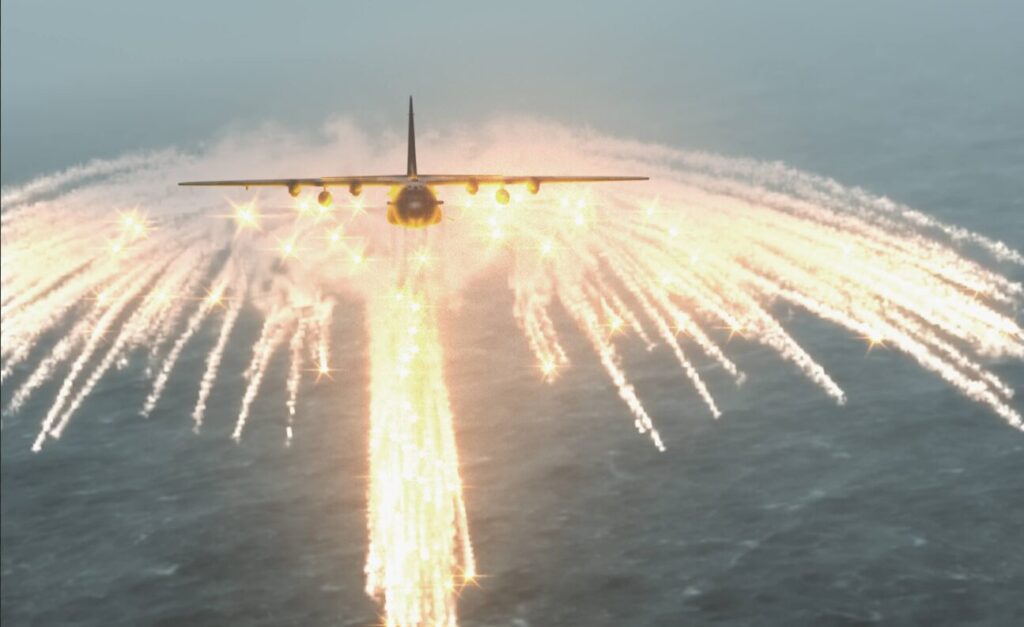 フレアを放出する軍用機