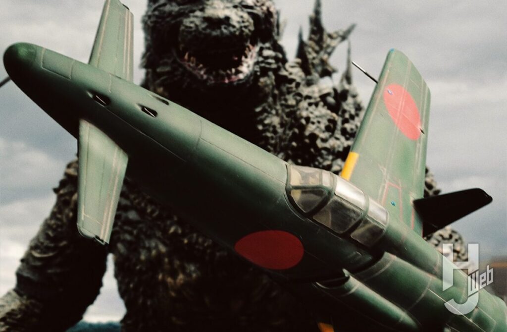 巨大怪獣と戦うレシプロ戦闘機